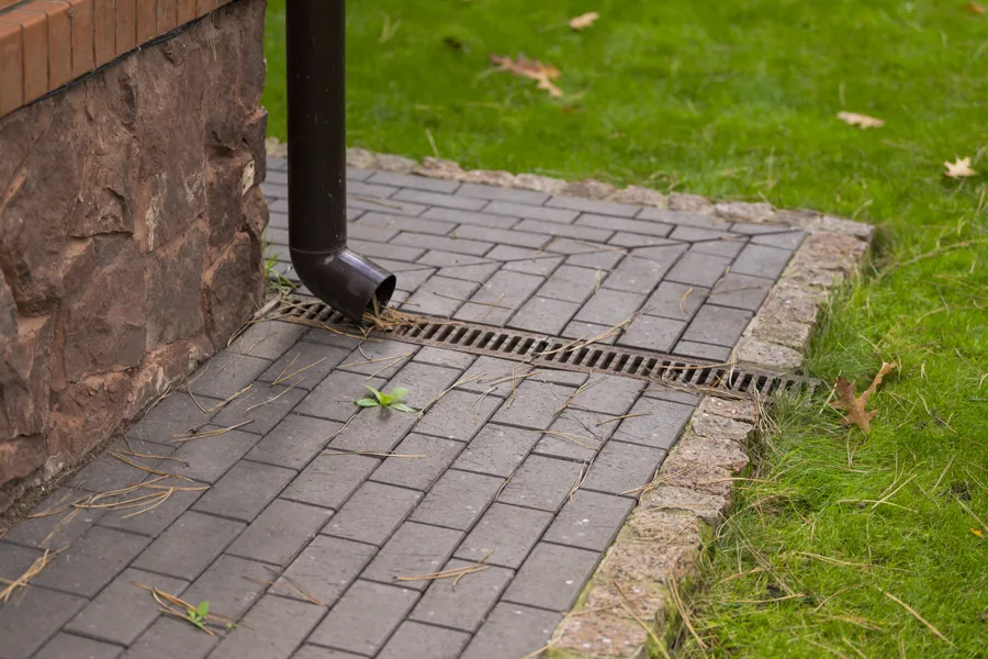 Why Downspout Extensions Prevent Foundation Damage Pflugerville, TX